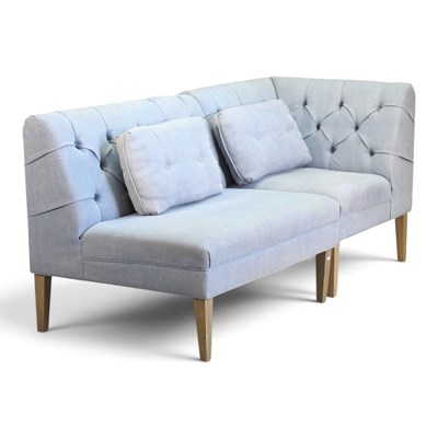 Lot 143 - An OKA blue upholstered corner sofa, in two...