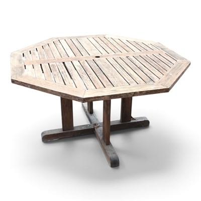 Lot 495 - A teak garden table, of hexagonal shape