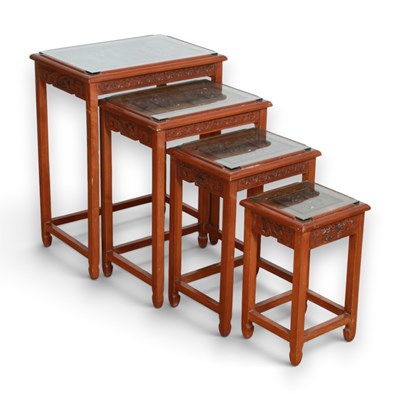 Lot 817 - A set of four Chinese carved hardwood nesting...