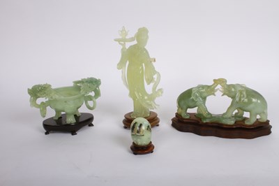Lot 302 - A collection of Chinese nephrite carvings