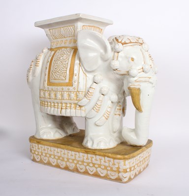 Lot 874 - A ceramic elephant plant stand with a white...