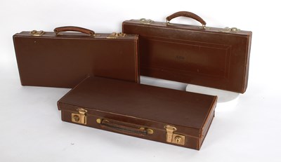 Lot 868 - Three vintage brown leather attaché briefcases...