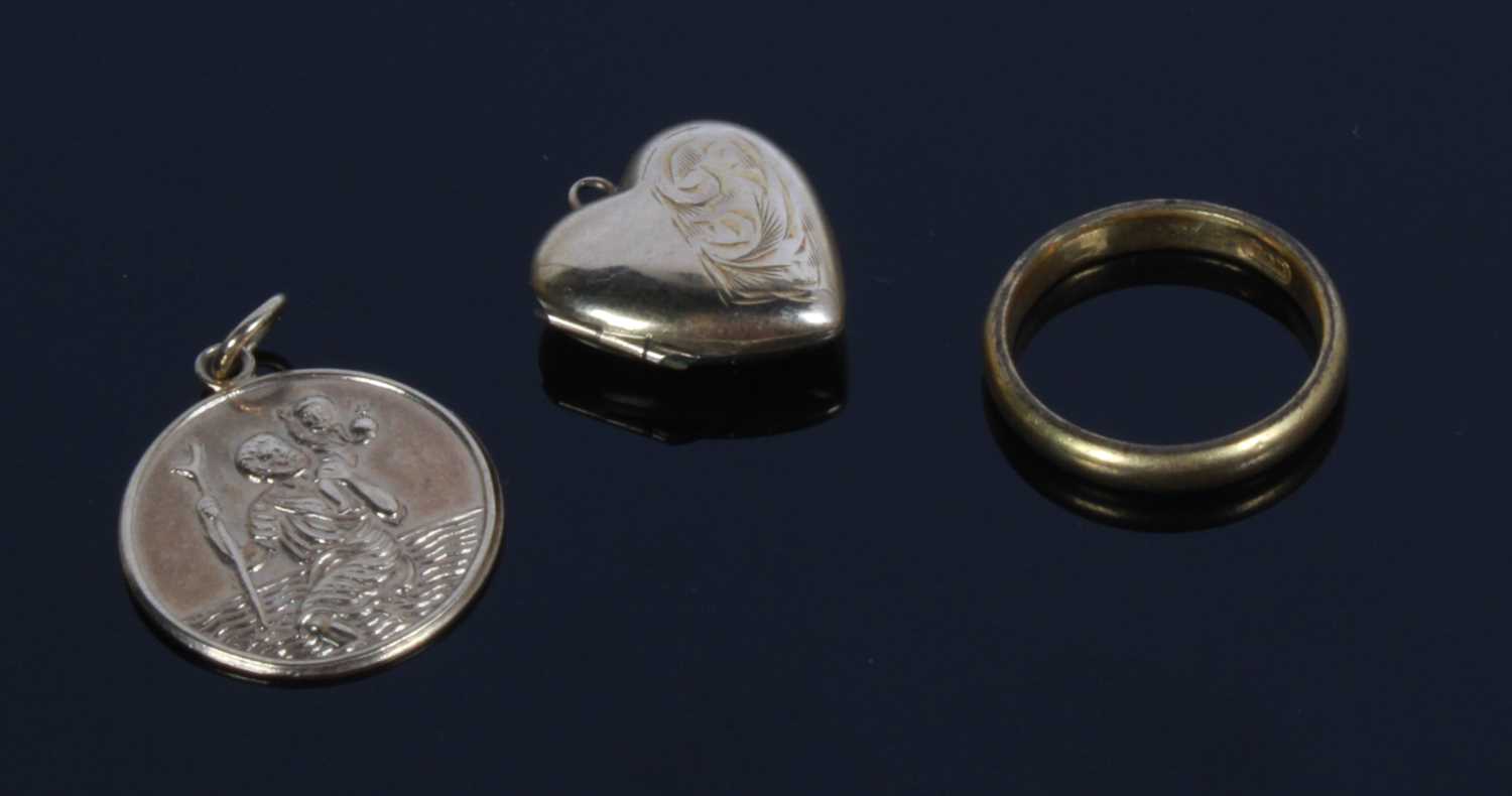 Lot 47 - Three yellow metal ring and pendants one of...
