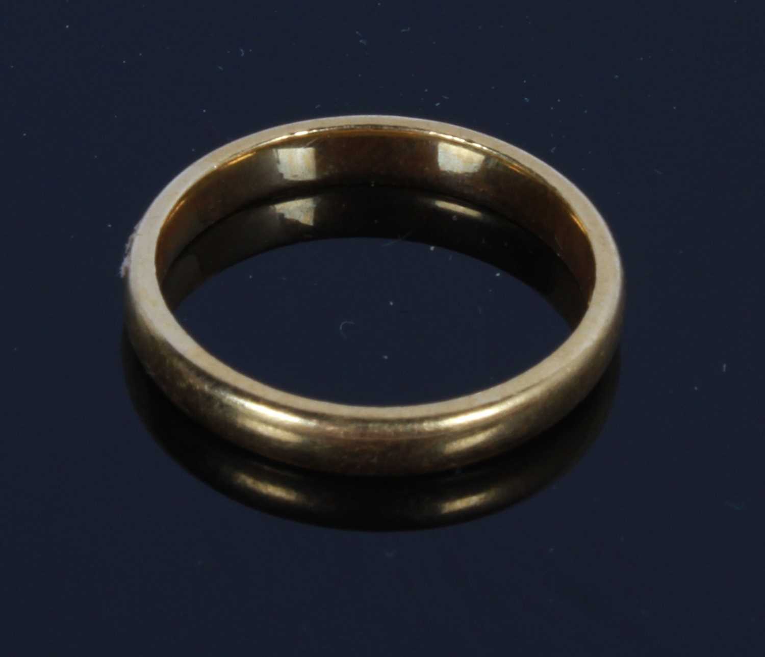Lot 28 - A 22 carat yellow gold wedding band, Size L, 3.5g