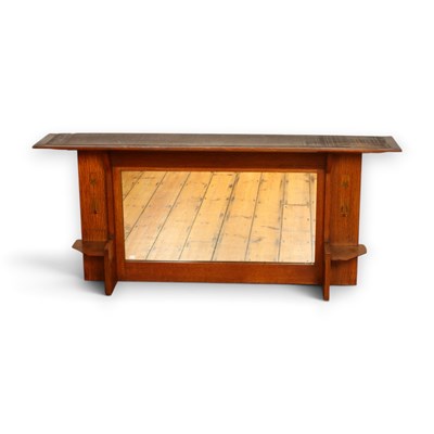 Lot 434 - An Arts and Crafts oak overmantel mirror...