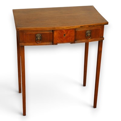 Lot 719 - A George III mahogany side table, having brass...
