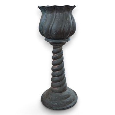 Lot 431 - An Arts and Crafts hammer beaten copper...