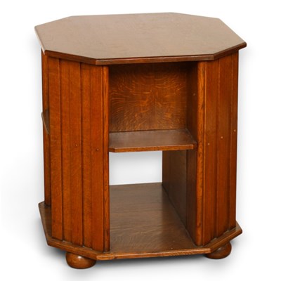 Lot 438 - An oak coffee table/bookcase, in the manner of...