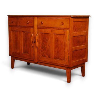 Lot 721 - A mid century Ercol style beech sideboard, 130cm