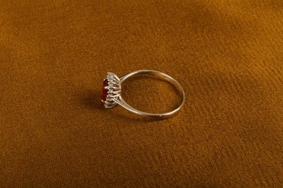 Lot 24 - A modern 18 carat white gold, ruby and diamond...