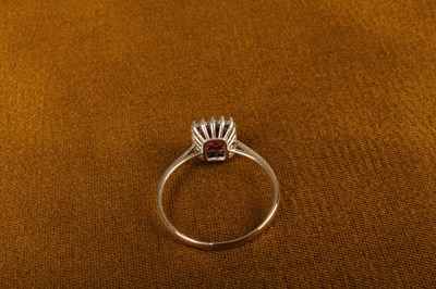 Lot 24 - A modern 18 carat white gold, ruby and diamond...