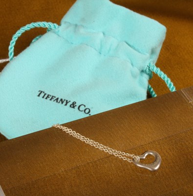 Lot 91 - A Tiffany silver heart shape pendant necklace,...