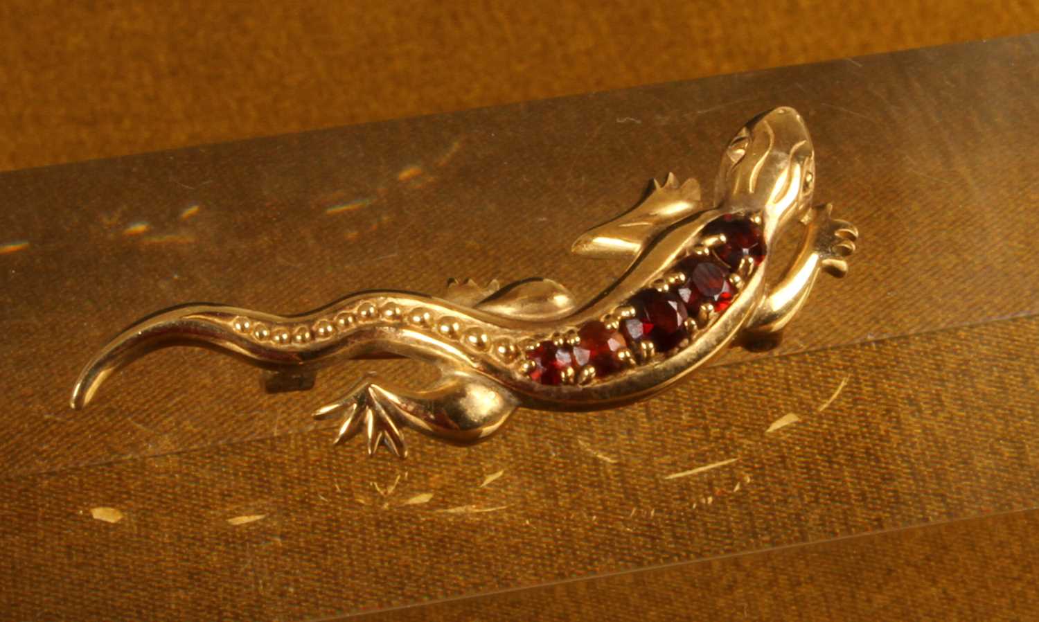 Lot 32 - A 9 carat gold bar brooch, in the form of a...