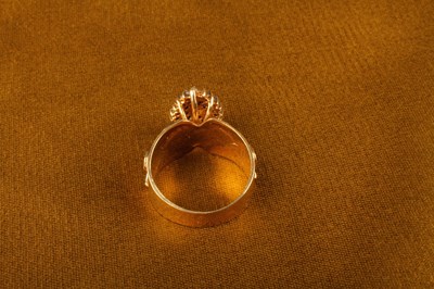 Lot 15 - An 10 carat gold diamond cluster ring, of...