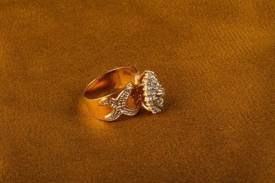 Lot 15 - An 10 carat gold diamond cluster ring, of...