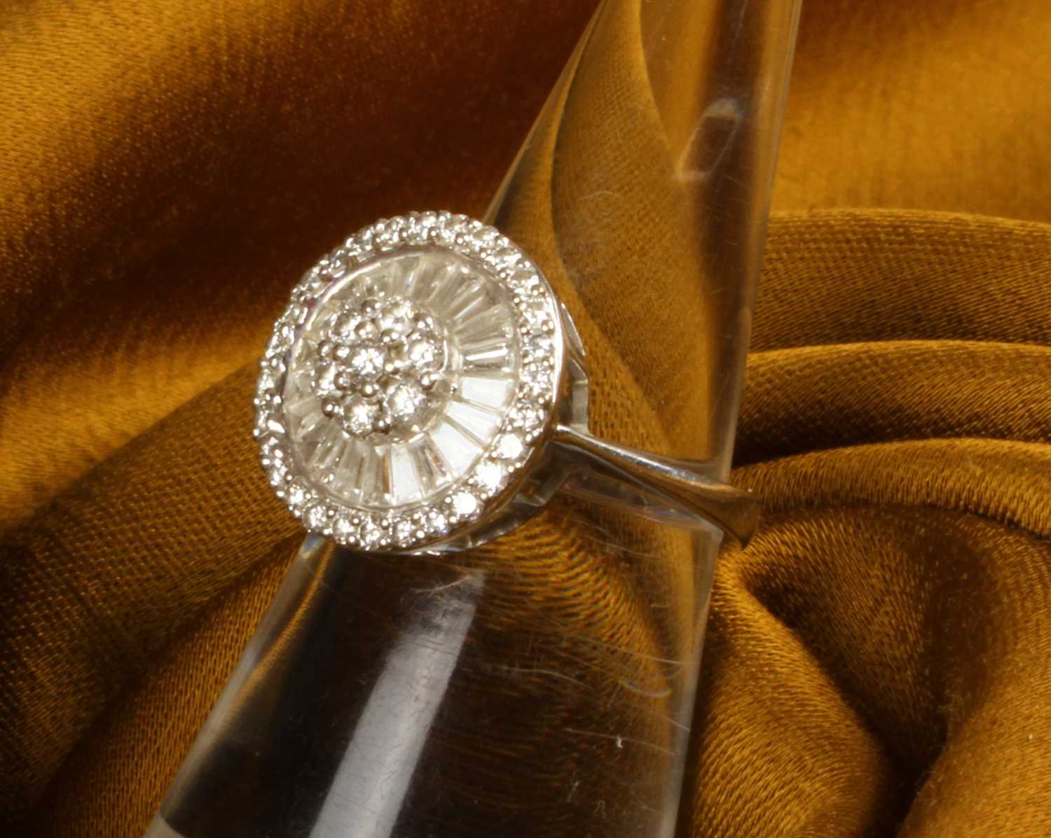 Lot 5 - A modern 18 carat white gold diamond ring, of...
