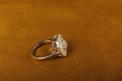 Lot 5 - A modern 18 carat white gold diamond ring, of...