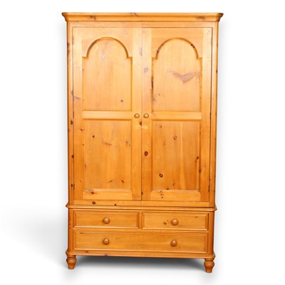 Lot 758 - A pine double wardrobe