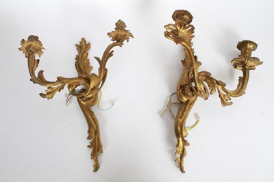 Lot 358 - A pair of Rococo style gilt metal twin branch...