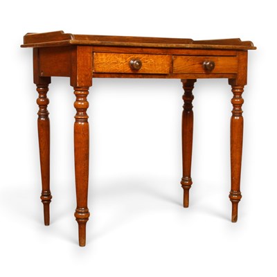 Lot 716 - A Victorian oak side table, with a three...