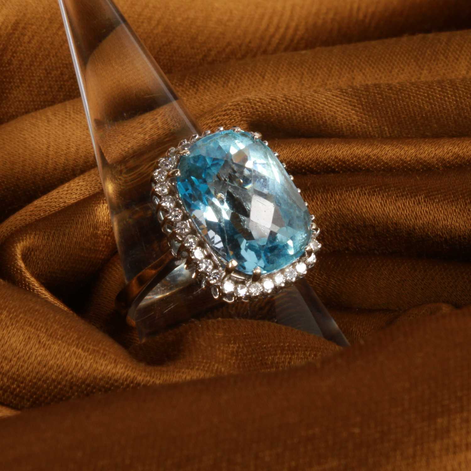 Lot 2 - An 18 carat white gold aquamarine and diamond...