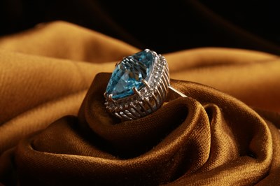 Lot 2 - An 18 carat white gold aquamarine and diamond...