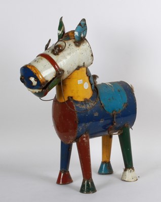Lot 901 - A recycled tin model of a horse, 73cm