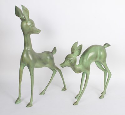Lot 360 - A pair of verdigris metal models of deer, 65cm