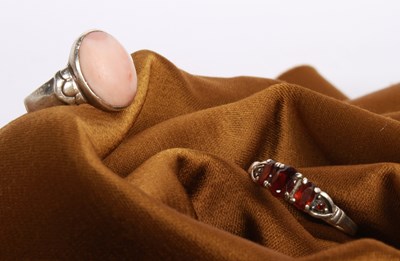 Lot 126 - A silver five stone garnet ring, size Q/R,...