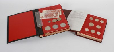 Lot 143 - Two coin albums and contents, to include an...