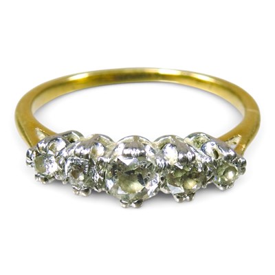 Lot 34 - A gold and platinum set diamond five stone...
