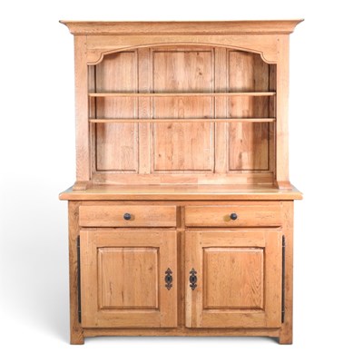 Lot 295 - A large modern light oak dresser, with a...