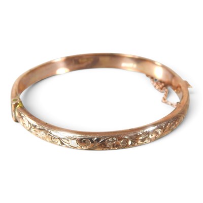 Lot 73 - A 9 carat gold christening bangle, with...