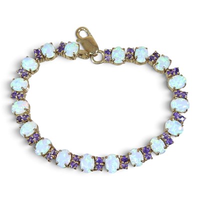 Lot 57 - A 9 carat gold, opal and amethyst line...