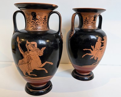 Lot 315A - A pair of terracotta vases, in the classical...
