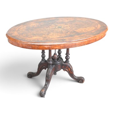 Lot 542 - A Victorian walnut and inlaid dining table, of...