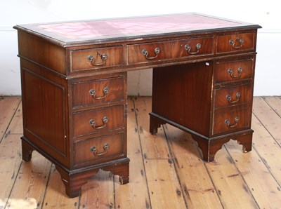 Lot 710A - A reproduction mahogany pedestal desk