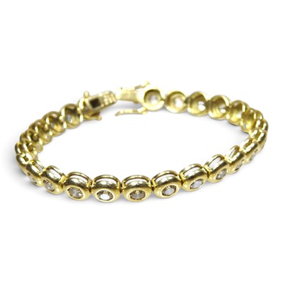 Lot 79 - An 18 carat gold and diamond set line bracelet,...
