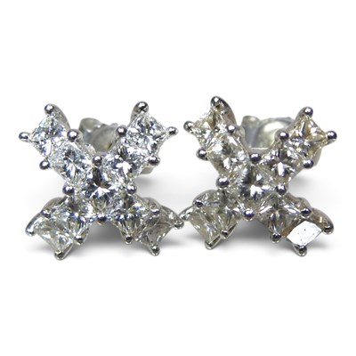 Lot 91 - A pair of platinum and diamond earrings, of...