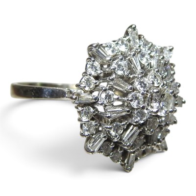 Lot 36 - A large 18 carat white gold diamond cocktail...