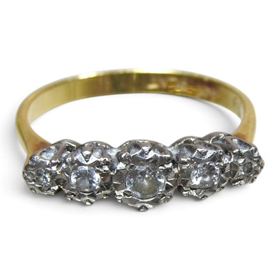 Lot 77 - An 18 carat gold five stone diamond ring, of...