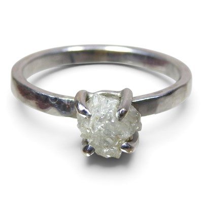 Lot 108 - An unusual 14 carat white gold diamond ring,...
