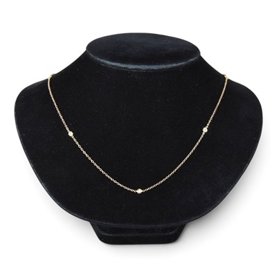 Lot 112 - An 18 carat rose gold and diamond necklace by...