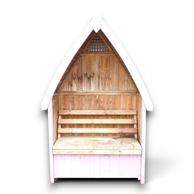 Lot 407 - A pink painted wooden garden arbour
