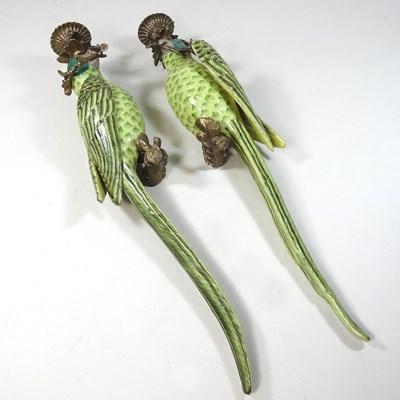 Lot 97 - A pair of reproduction parrot wall sconces
