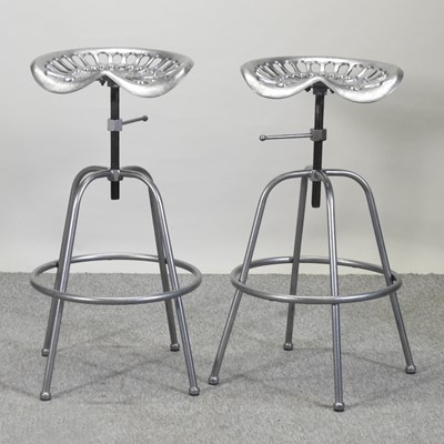 Lot 49 - A pair of painted metal tractor seat stools