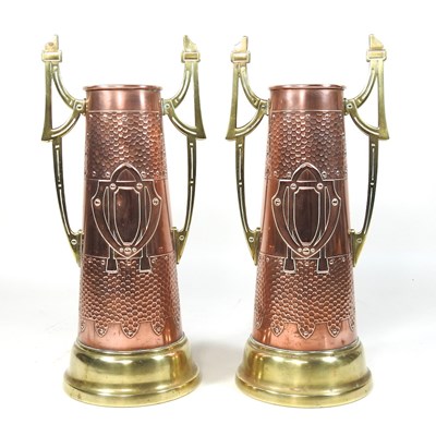 Lot 48 - A pair of Arts and Crafts brass and copper vases