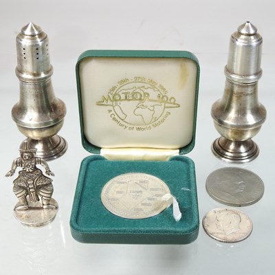 Lot 8 - A pair of early 20th century silver peppers