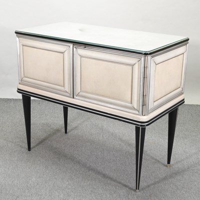 Lot 651 - A 1950's Italian cream padded vinyl sideboard