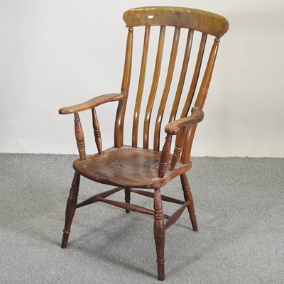Lot 510 - A 19th century Windsor style armchair